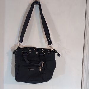Black Shoulder Bag with Adjustable Strap and Zipper Closures